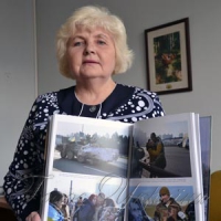 Альбом подарували музею