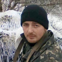 Білим цвітом прощався край з героєм